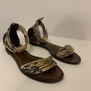 Tory Burch gladiator sandals.